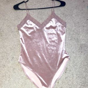 Medium sized satin body suit